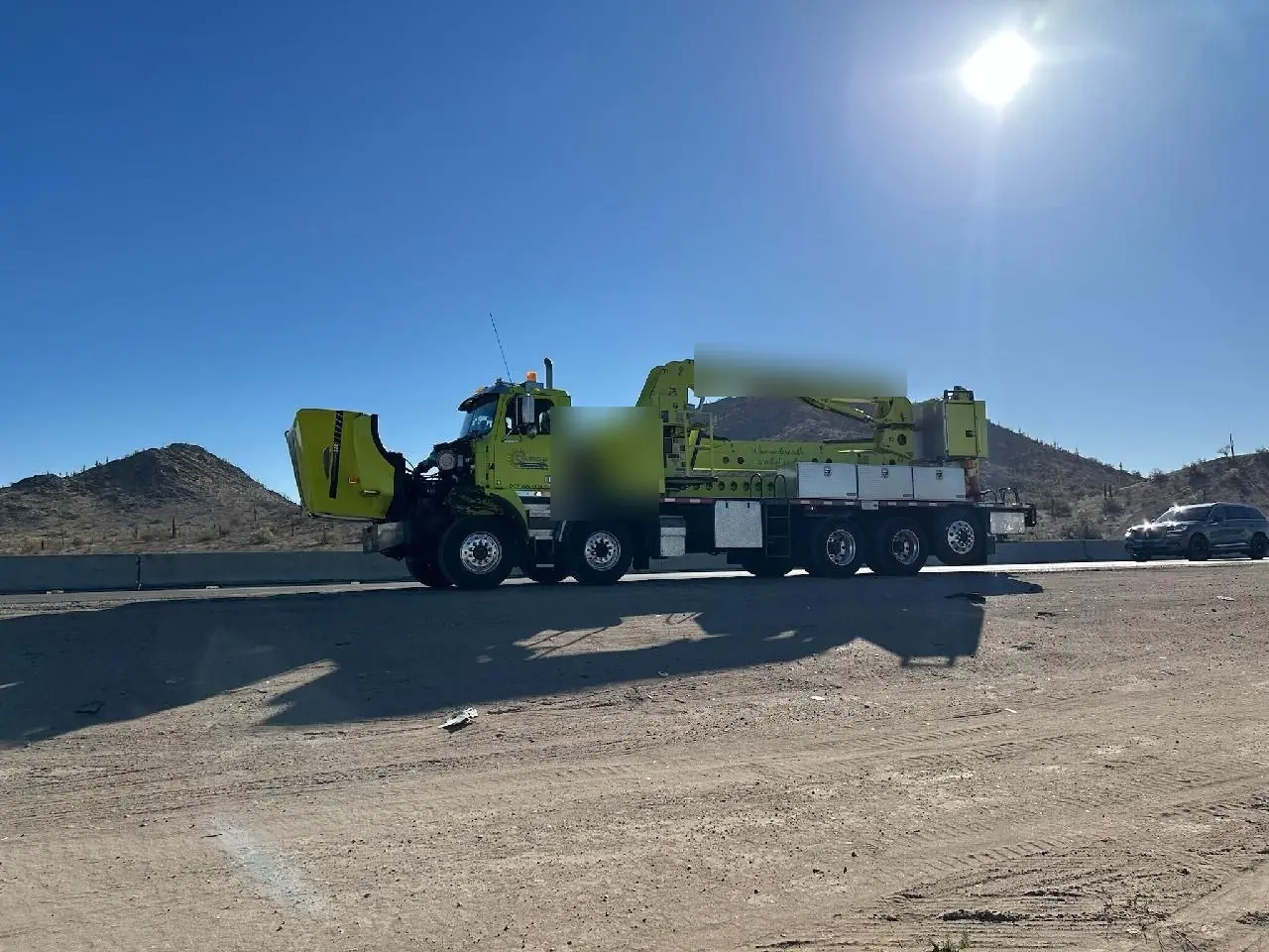 Roadside repair call for a heavy crane truck broken down on an Arizona highway